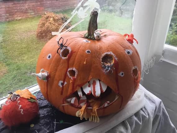 Lorraine Overton shared this spooky, hungry and infested pumpkin.