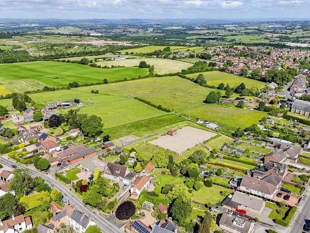 The family home enjoys direct access to open fields and offering a wonderful blend of countryside charm and contemporary living.