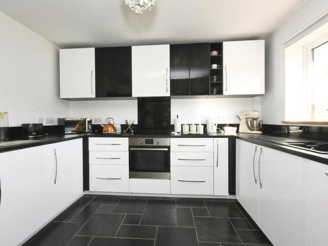 The kitchen comes with built-in appliances and storage space aplenty. Not many culinary experts would turn their noses up at this.