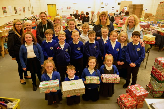 Pupils and staff from Westoe Crown Primary School with their shoe boxes in 2018.