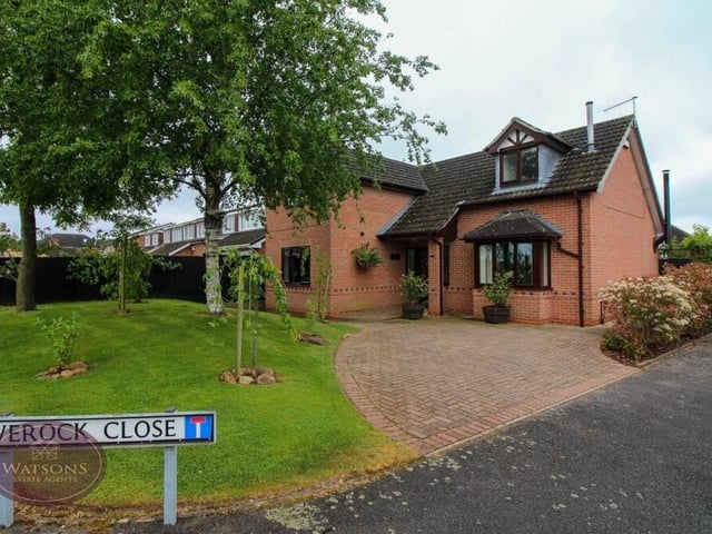 The final photo in our gallery returns to the front of the property and underlines the delightful corner plot that it occupies on the Kimberley town centre cul-de-sac. Sandwiching a a block-paved driveway are shrubs and a well-tended lawn with trees.