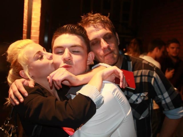 A quick peck on the cheek