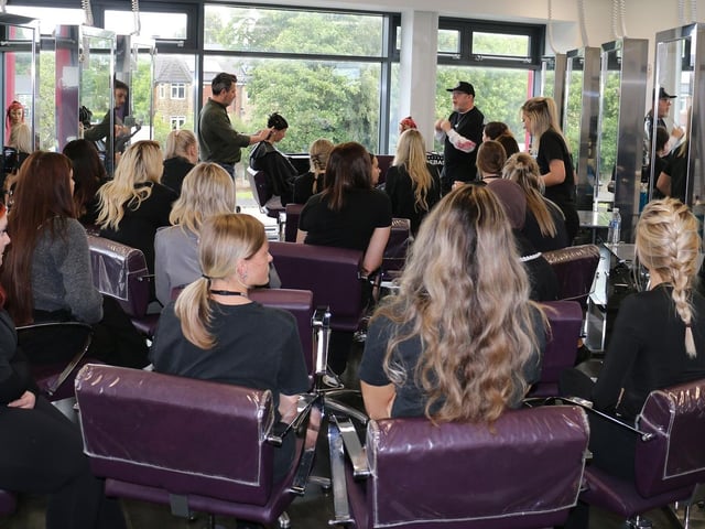 The duo showcased advanced cutting and styling techniques to the eager audience.