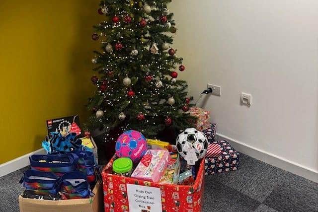 Allison Homes East Midlands office Christmas tree, with gifts donated for the KidsOut Giving Tree initiative