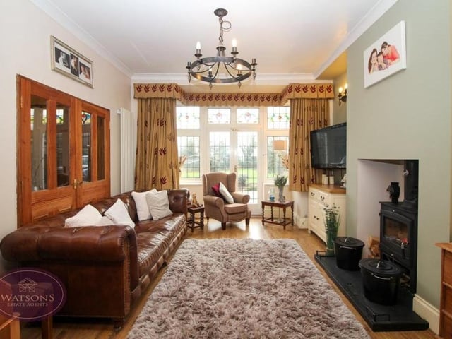 Our photo gallery of the Kimberley property begins in the spacious lounge. It has a double-glazed bay window facing the back of the house and French doors leading out to the garden.