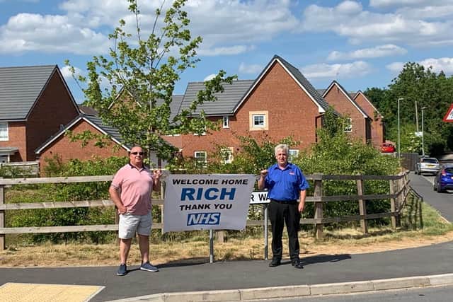 Richard's close friends Paul Chaplin and Darran Harvey welcoming him home.