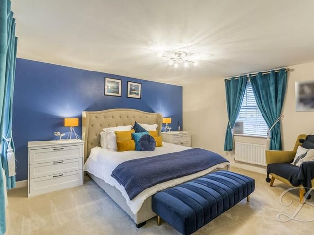 This beautifully presented main bedroom on the first floor is the largest of the five. Kept to an immaculate standard, it has access to an en suite shower room and to large, fitted wardrobes.