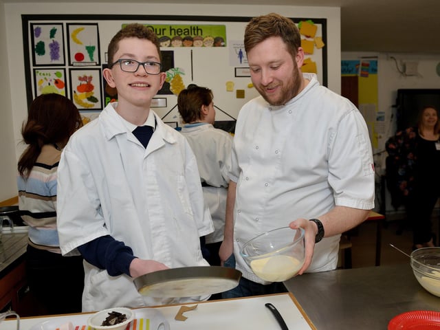 Pancake competiton at Dawn House School with cookery demonstration with Masterchef's Tom Moody, Tom is pictured with Lloyd