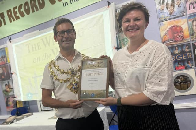 Competition winner Stephanie Bognar receiving her award from Mansfield mayor Andy Abrahams. Photo: Submitted