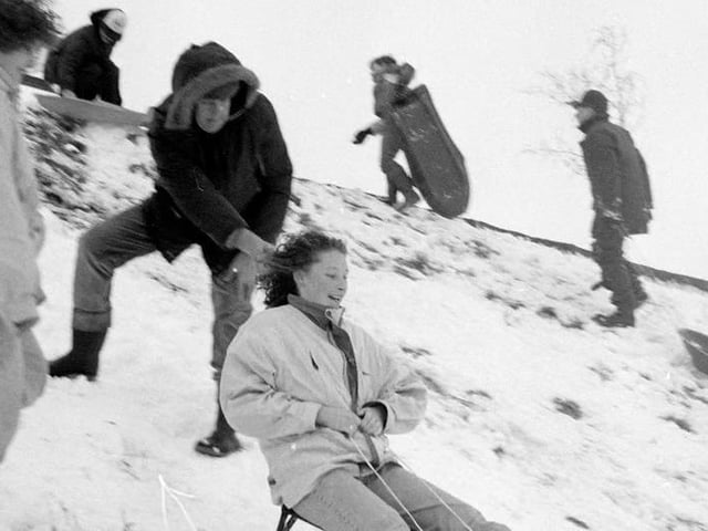 Mansfield residents take a day off to enjoy sleighing back in 1990.