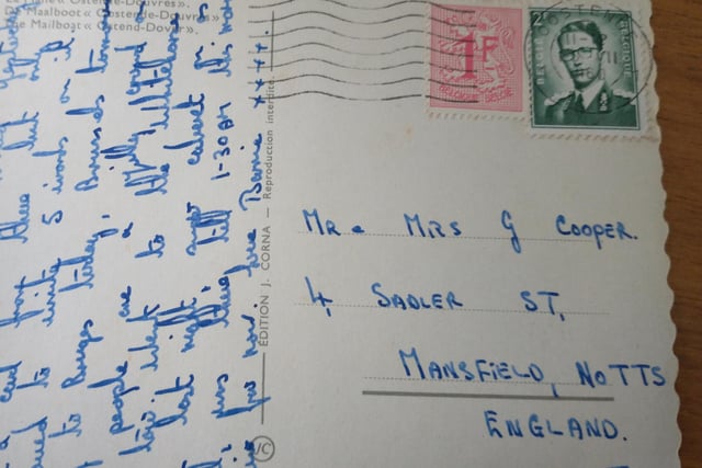 A postcard addressed to Mr and Mrs Cooper.