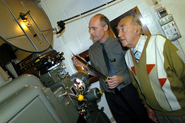 Chief projectionist Andy Baker and Lord Mason in the projection room at The Odeon, Barnsley in 2005