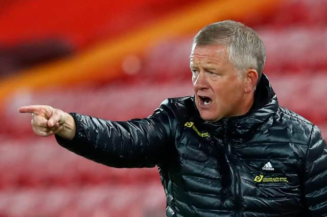 Manager Chris Wilder gestures from the touchline during the Premier League football match between Liverpool and Sheffield United at Anfield.