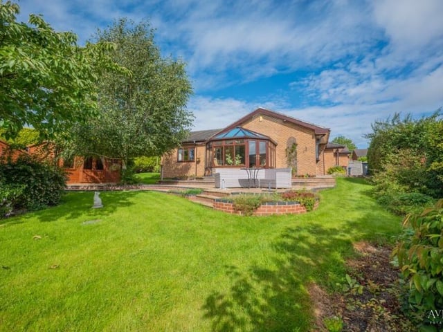 The mature rear garden, surrounded by trees, shrubs, bushes and hedges, is a veritable sun trap. It's also perfect for the kids to burn off energy.