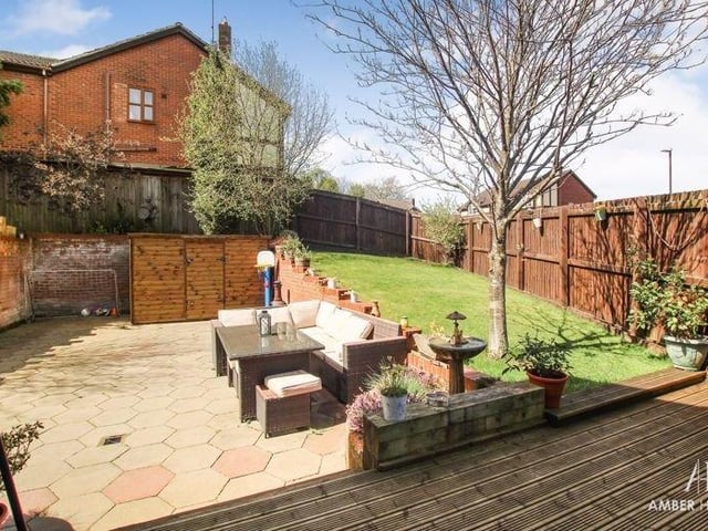 What a lovely patio area this is. You can imagine spending many a warm evening or weekend, relaxing here with family or friends.