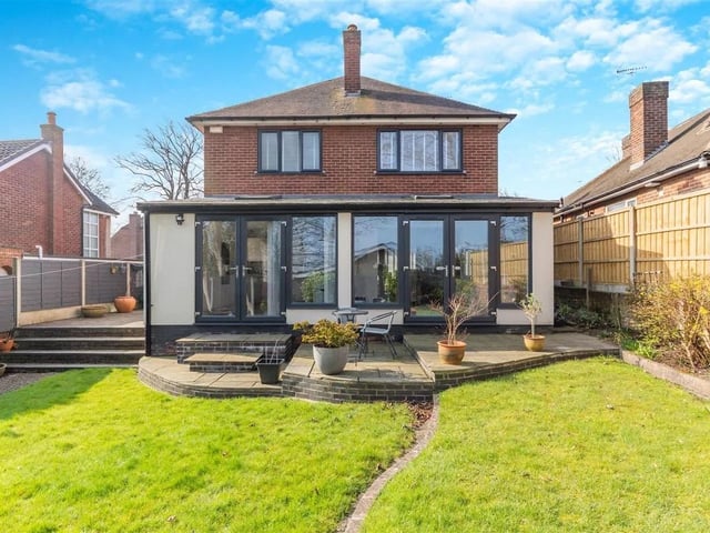 To the rear of the property, there are ample sandstone patio areas immediately off the snug and kitchen with an external power point and a step leading to the garden mainly laid to lawn.