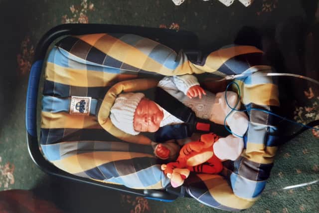 A rare trip out for baby Kieron.