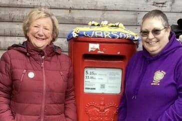 President Sharlotte and member Gloria with their postbox topper