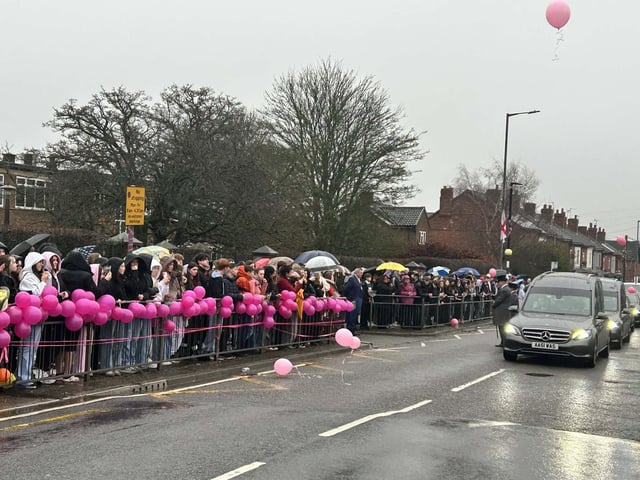 Balloons were released as the cortege went by Quarrydale Academy in Sutton