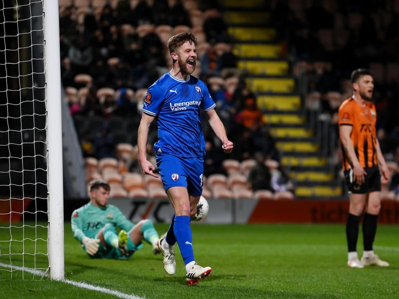 Northampton Town have re-signed midfielder Michael Jacobs following his release by Chesterfield.