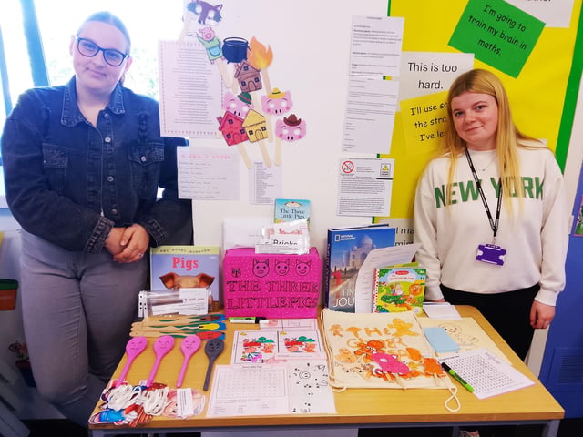 Millie Grace Allcock and Lily Yates with their chosen books and interactive resources