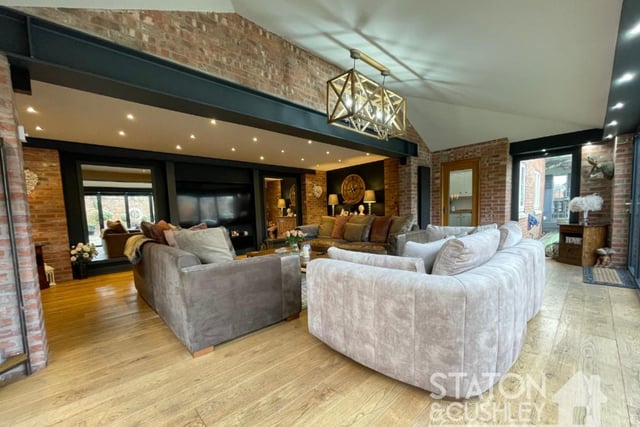 At the heart of the ground floor is this breathtaking open-plan lounge, full of fascinating features, including steel skirting boards and a solid oak floor.