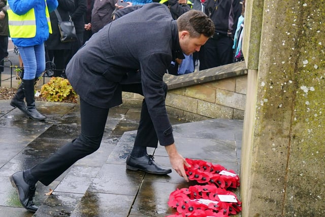 Ben Bradley lays a wreath at the Mansfield Remembrance parade and service