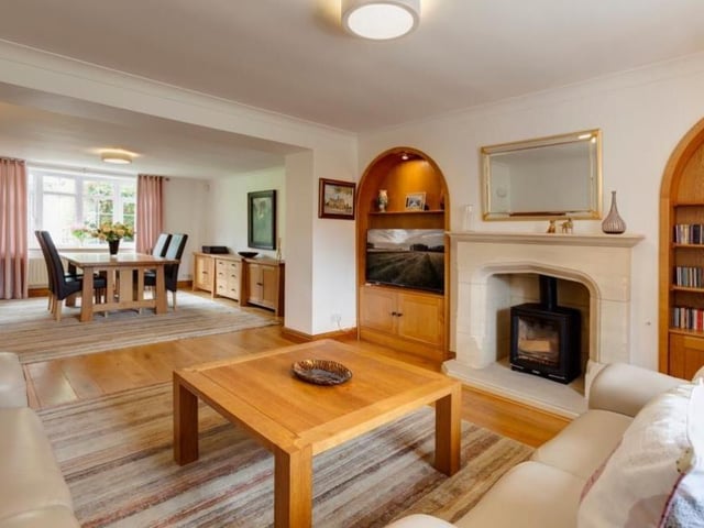 This shows how the combination of the dining room and sitting room creates a pleasant open-plan area of the £950,000 house.