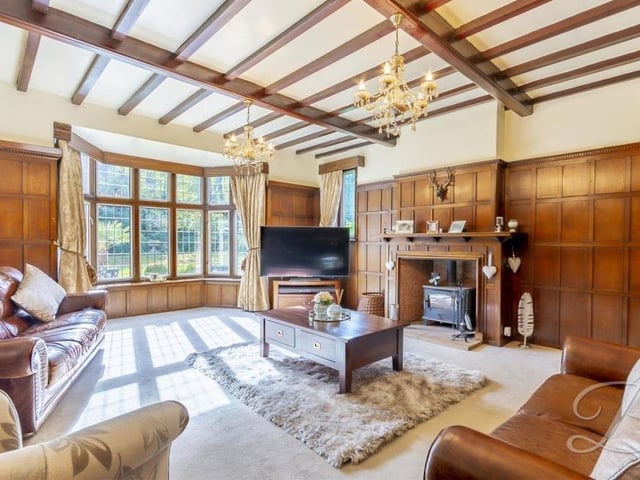 It's impossible not to be impressed by the lavish living room at the High Oakham Road property. Assets include an inglenook fireplace and ceiling beams, with a bay window overlooking the back of the house.