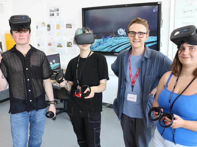 Artist Joseph Doubtfire (second right) with students (from left) Reece Reddish, River Smith and April Barlow at a VR painting workshop that he ran.