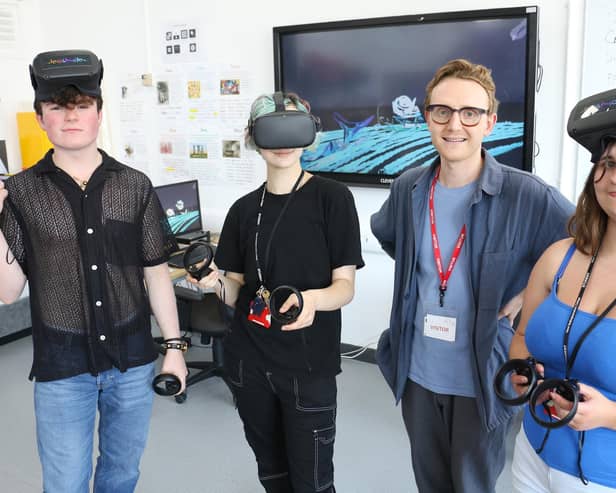 Artist Joseph Doubtfire (second right) with students (from left) Reece Reddish, River Smith and April Barlow at a VR painting workshop that he ran.
