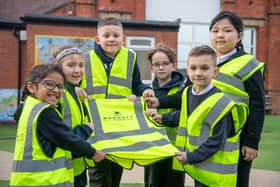 B&DWNM - SGB-17245 - Pupils at Forest Glade Primary School with hi-vis vests donated by Barratt Homes