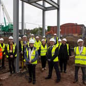 Pictured are Ashfield District Council leader Coun Jason Zadrozny, Theresa Hodgkinson, director of place and communities, Lorenzo Clark, Everyone Active contracts manager, Ollie Hynd, council chairman Coun Arnie Hankin, David Sewell, Kier project manager, Carol Cooper-Smith, council chief executive, and and Kirkby councillors.