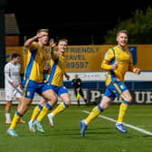 Rhys Oates celebrates his goal against Tranmere.