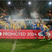 Mansfield Town finally celebrate promotion last Tuesday. Photo by Chris & Jeanette Holloway/The Bigger Picture.media