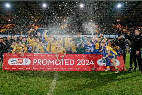 Mansfield Town finally celebrate promotion last Tuesday. Photo by Chris & Jeanette Holloway/The Bigger Picture.media