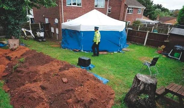 Police exhuming the remains of William and Patricia Wycherley in Forest Town, Mansfield when the murders were discovered in 2013