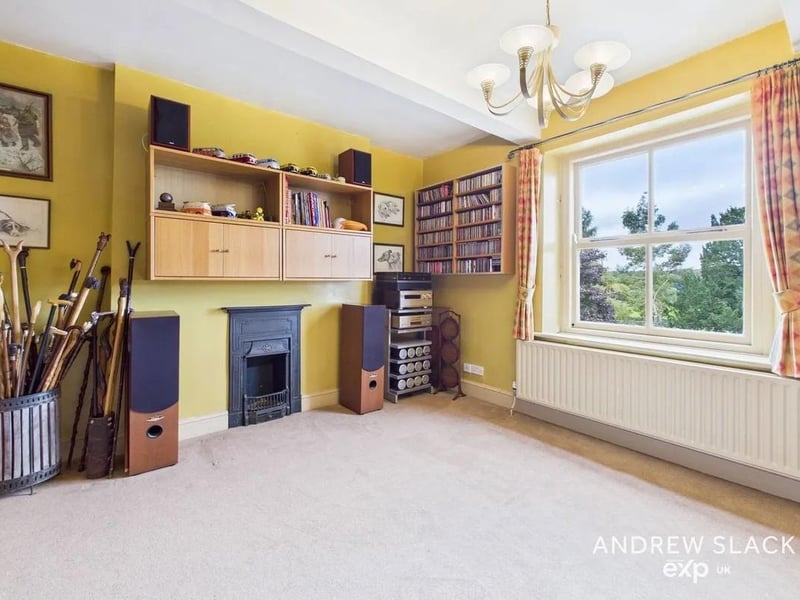 The property is filled with original features including stunning fireplaces.