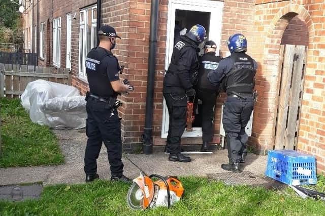 Police found drugs and a stolen motorcycle in raids at houses in Chatsworth Street, Sutton.