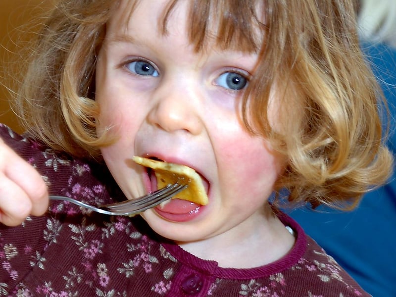 Charlotte Thompson, aged three, tucked into a pancake at the Methodist Church Hall in Tickhill in 2010. The event was organised to raise money for the Doncaster Live at Home scheme.