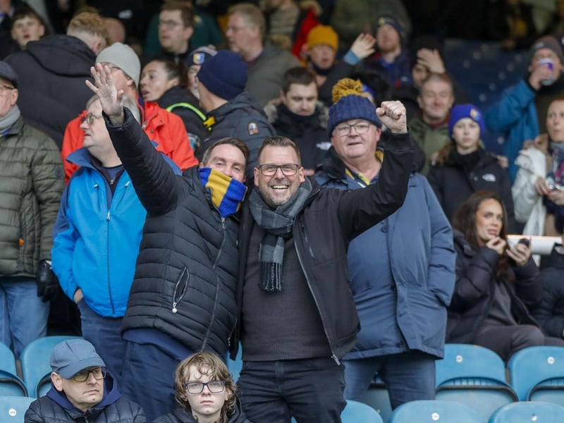 Mansfield Town fans watch the brilliant win at Peterborough United.