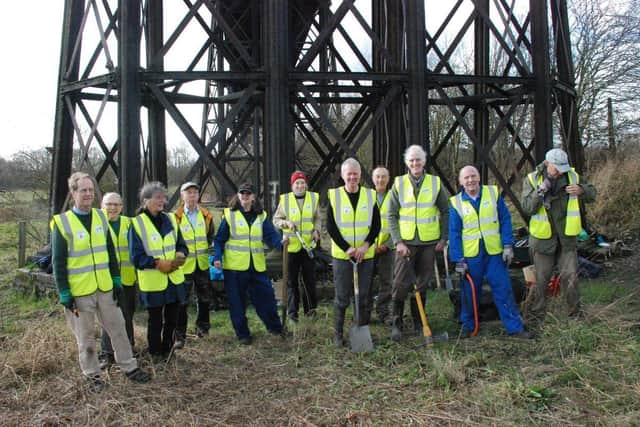 Volunteers undertaking environmental work at Bennerley Viaduct.