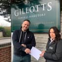 Chris Tomlinson, centre manager at The Tin Hat Centre in Selston receives a donation from Danni Allen, of Gillotts.
