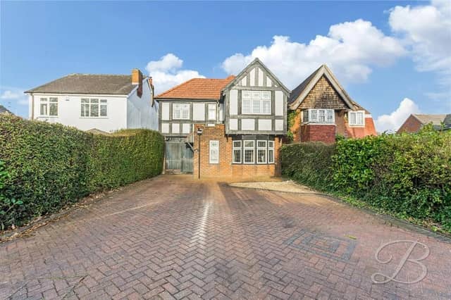 To the front of the property is a private driveway and garage, allowing space for both off-road parking and secure storage.