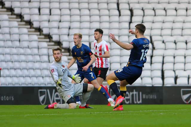 Mansfield Town forward Rhys Oates takes his chance. Photo credit should read: Chris Holloway / The Bigger Picture.media