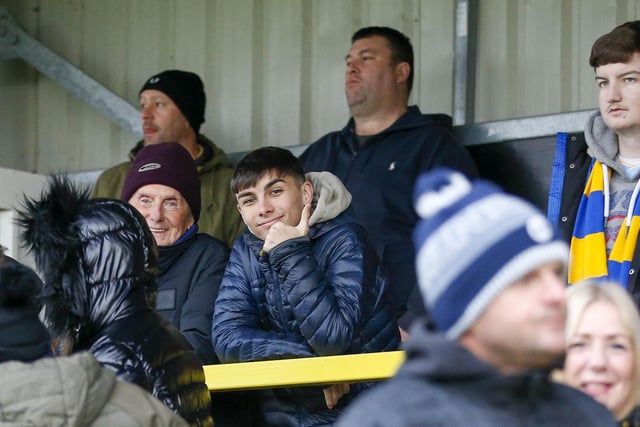 Mansfield fans at The EnviroVent Stadium for the match against Harrogate Town.