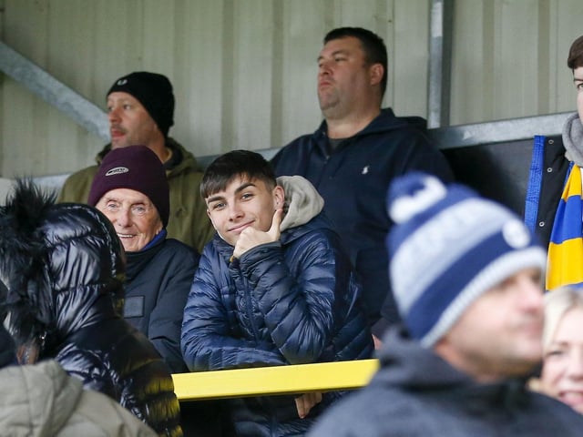 Mansfield fans at The EnviroVent Stadium for the match against Harrogate Town.