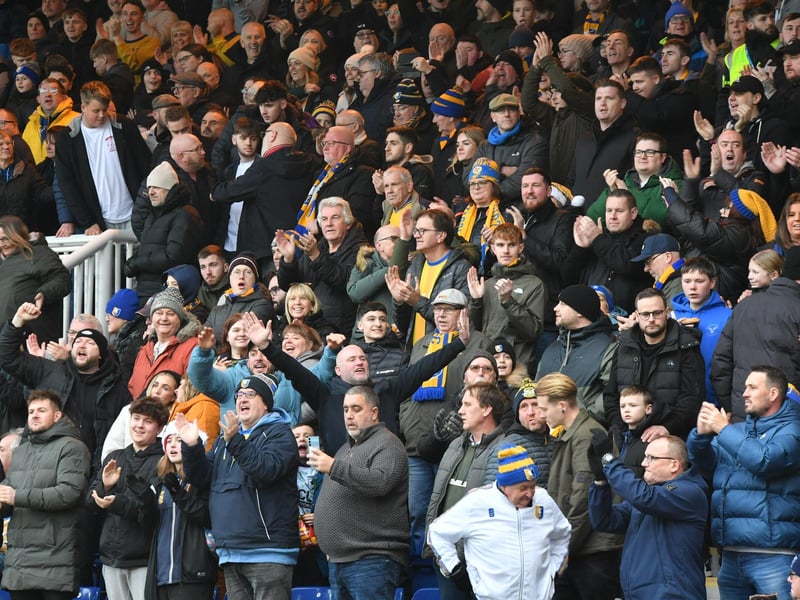 Mansfield Town fans watch the brilliant win at Peterborough United.