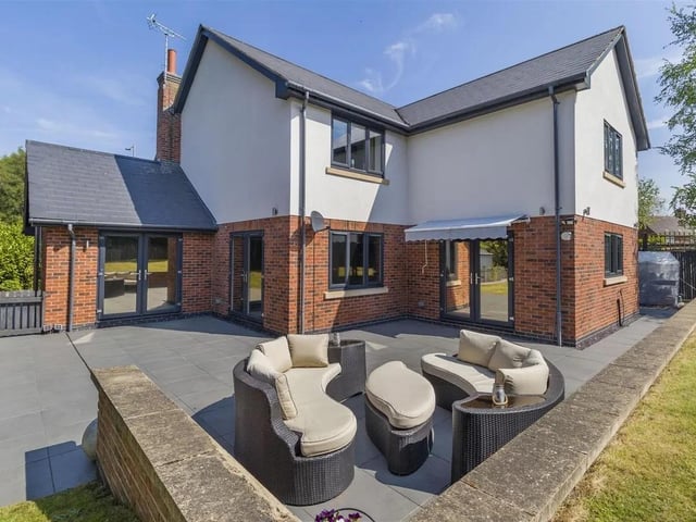 The garden is the perfect spot to enjoy family barbecues or entertain guests.