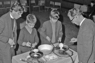 A pancake making competition in February 1970, at the Methodist church on Chesterfield Road South, Mansfield.